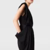 Deep V-Neck Shoulder Pad Pleated Jumpsuit Deep V-Neck Shoulder Pad Pleated Jumpsuit