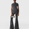 Leopard-Print Mid-Rise Flared Pants Leopard-Print Mid-Rise Flared Pants
